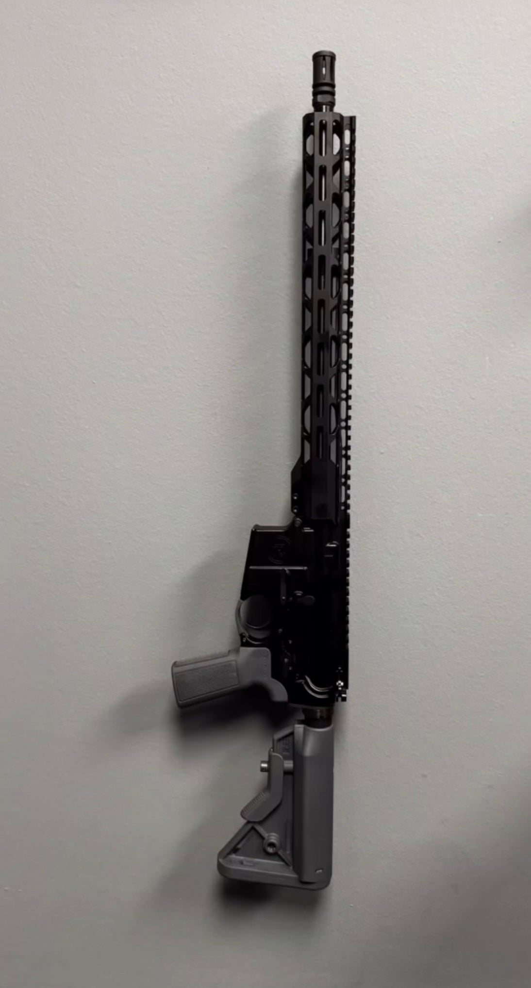 Black rifle on a white background